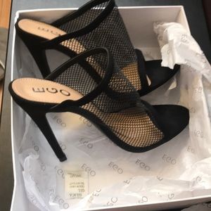 Gorgeous black mules.